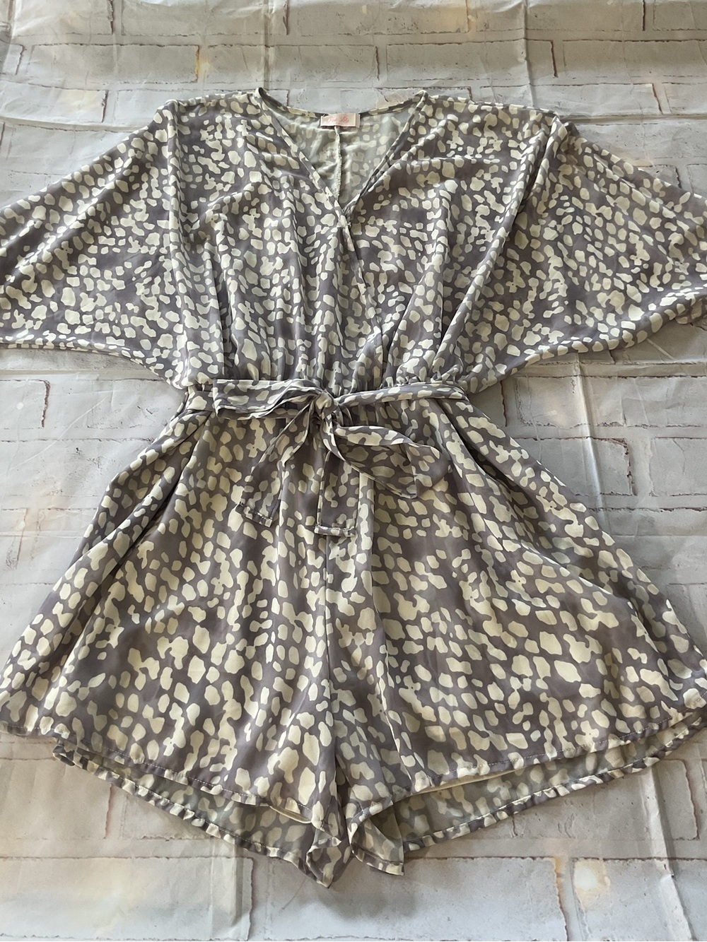 Pink Lily Taupe and Cream Animal Print Romper